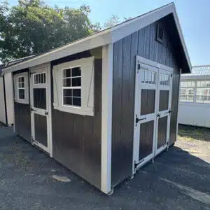 10x14 charcoal gray A-frame shed with double doors, transom windows, and white trim.
