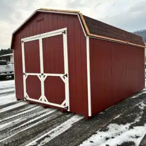 12x16 Carolina Dutch shed, Model 2033S, with Shed Red Smartside siding, white trim, black shingled roof, and 7x7 double doors.
