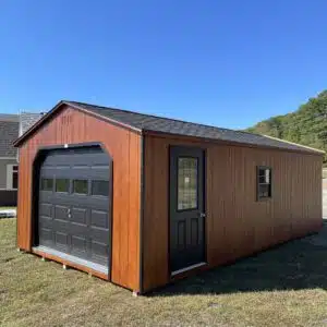 14x26 Smartside A-Frame garage in redwood with black trim, 9x7 black garage door with lites, entry door with 9 Lite glass, and two black-trimmed windows.