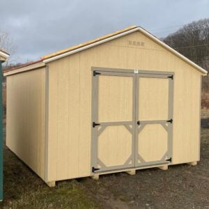 32103S 12x12 Carolina Cottage in Stoltzfus Tan with GP Clay trim, Harvard Slate roof, and 18x23 window rear side view.