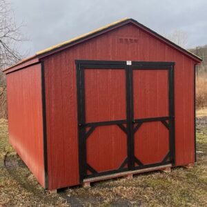 32105S 10x14 Carolina Cottage in Shed Red with black trim, black roof, and 6x6 double door front view.