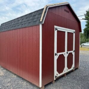 10x12 Carolina Dutch shed in red with white trim and black shingles featuring 5 ft double doors