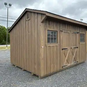 10x14 Quaker shed in smoke stain with pine board and batten siding, 5-foot double doors with tread, and two windows