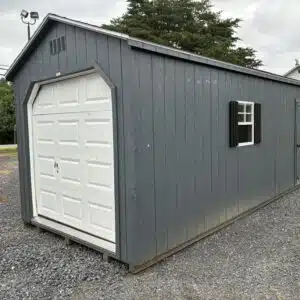 9x22 A-Frame garage in dark gray with 7x7 white garage door, side entry door, and window with black shutters
