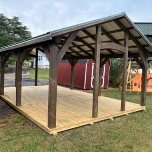 14x24 arch pavilion in mushroom stain with hunter green metal roof and pressure treated deck board floor