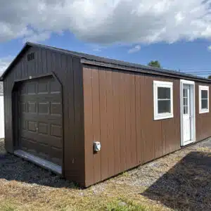 Brown 14x30 A-frame garage showing 9x7 brown garage door, side entry door, and windows