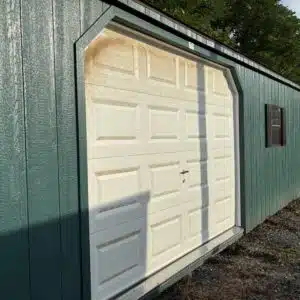 14x40 Smartside A-Frame garage in hunter green with dual brown trim and 9x7 garage door