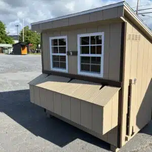4x6 LeanTo chicken coop in Buckskin with brown trim, two windows, and exterior nesting box