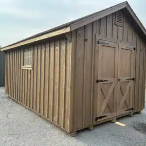 Side view of a Smoke-stained 10x16 Cape Series shed with white pine board and batten siding, 5-foot double doors, and screened vent