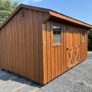 10x16 Hudson Quaker shed with Wilderness Ultra Log Stain in Butternut, 2-tone brown shingles, 5-foot double doors, and 24x27 window