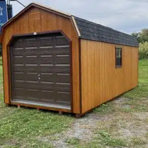 10x20 Smartside barn garage with natural cedar siding, dual black roof, and 8x7 brown garage door
